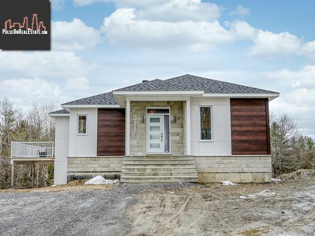 Property 311 Rue Bergeron E. main img
